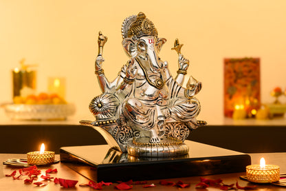 Ganesha on Throne Idol with 999 Silver & 24K Gold Finish – Four-Armed Form with Axe, Modak & Throne Detail