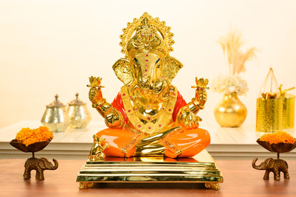 24K Gold Ganesha Idol with Orange Dhoti and Lotus Blessing Posture
